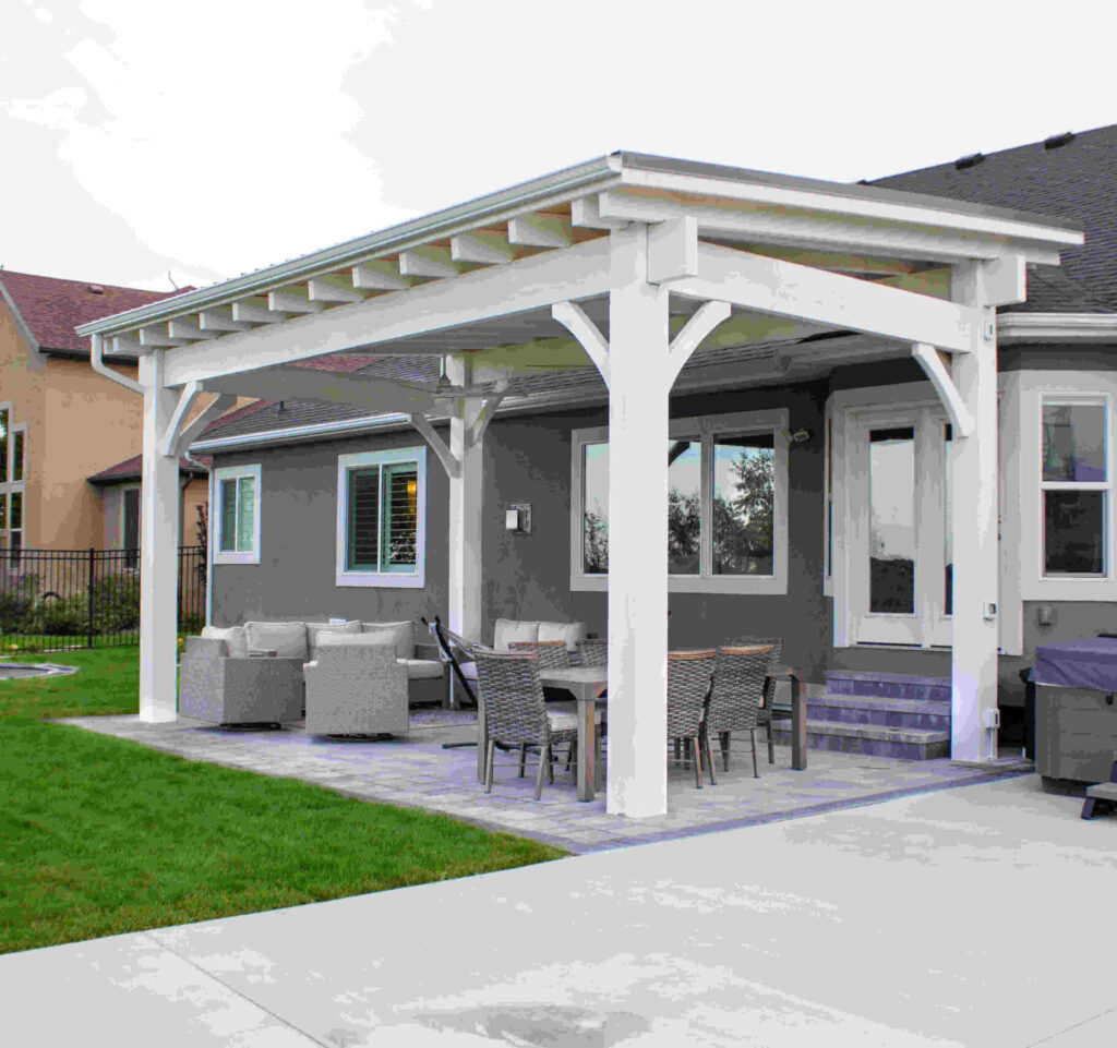 Full landscape design in Bluffdale Utah featuring outdoor lighting, irrigation, and custom patio — Millburn Lawn & Landscape