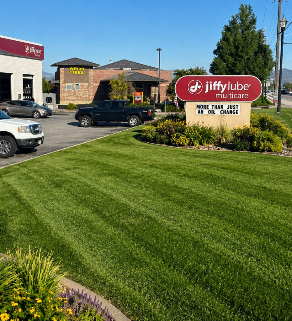 Commercial property manager reviewing landscaping problems at a Saratoga Springs Utah business property