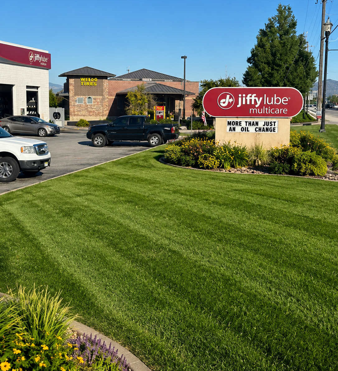 Commercial property manager reviewing landscaping problems at a Saratoga Springs Utah business property