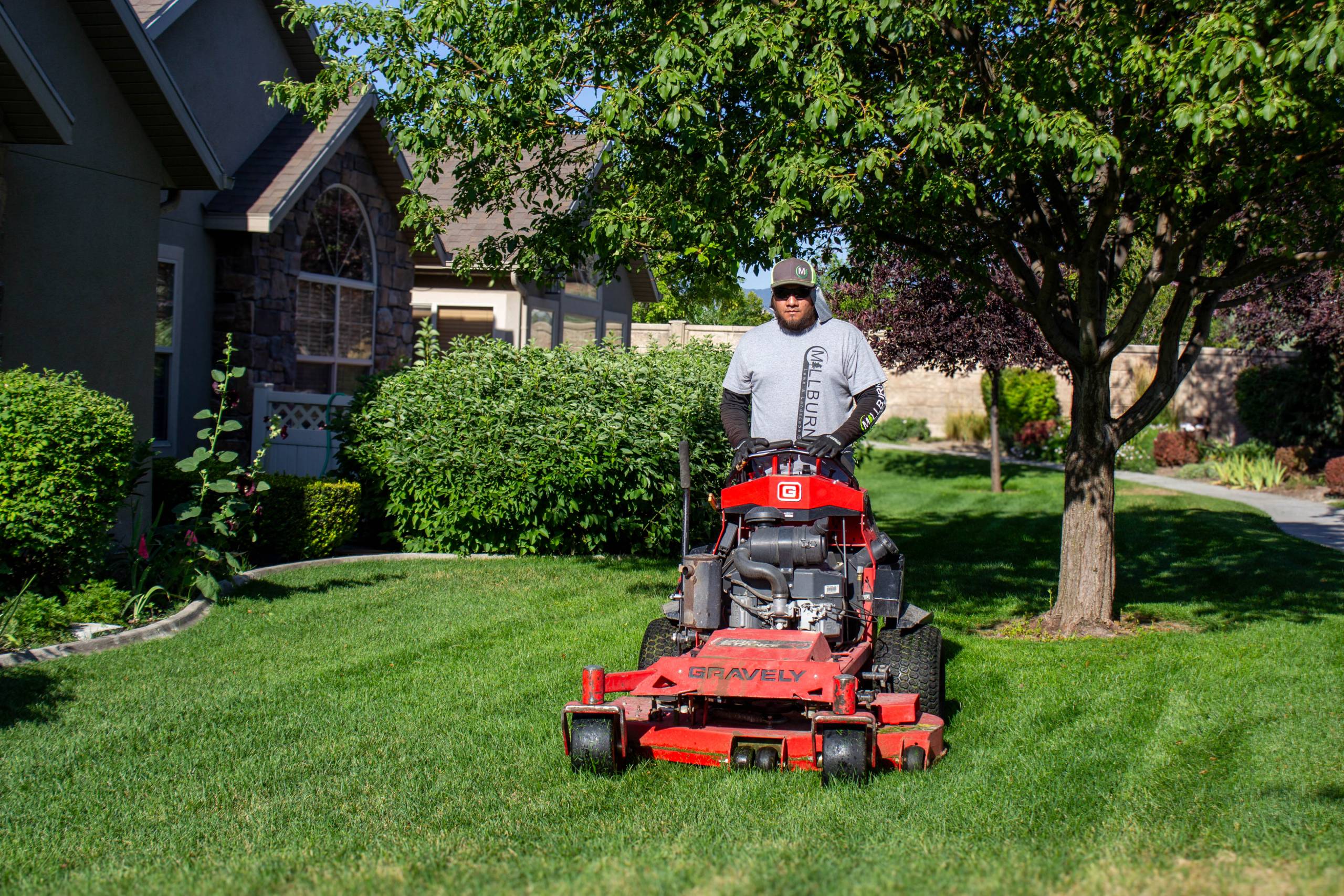 Manicured lawn and edged flower beds on a South Jordan, Utah property